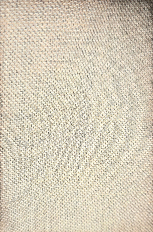 Close-up of the beige textured wool blend fabric from a Barutti.ae premium blazer showing the detailed weave.