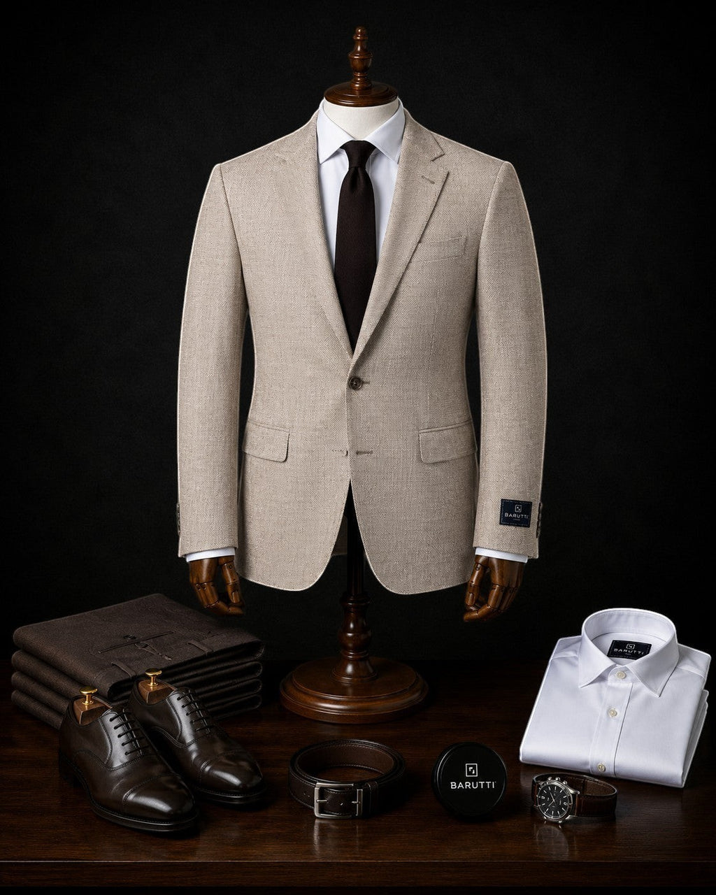 Barutti.ae beige textured wool blend blazer on a mannequin with a white shirt, dark tie, trousers, and leather shoes.