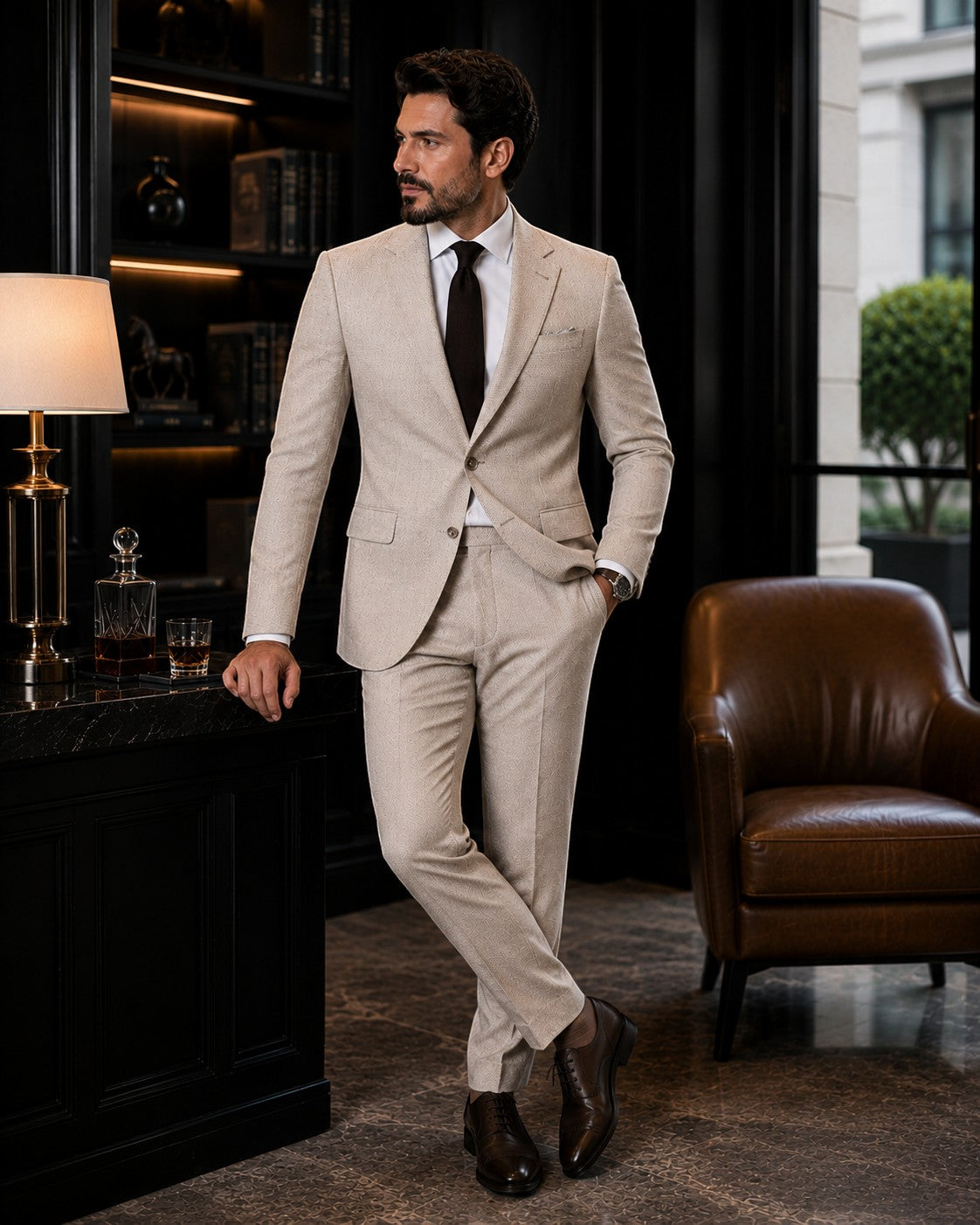 Barutti.ae beige textured wool blazer and trousers worn by a man in a sophisticated office setting.