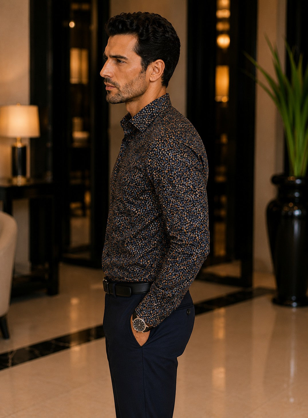 Barutti.ae Casamoda charcoal casual shirt with orange and grey floral micro-print worn by a man in a luxury interior