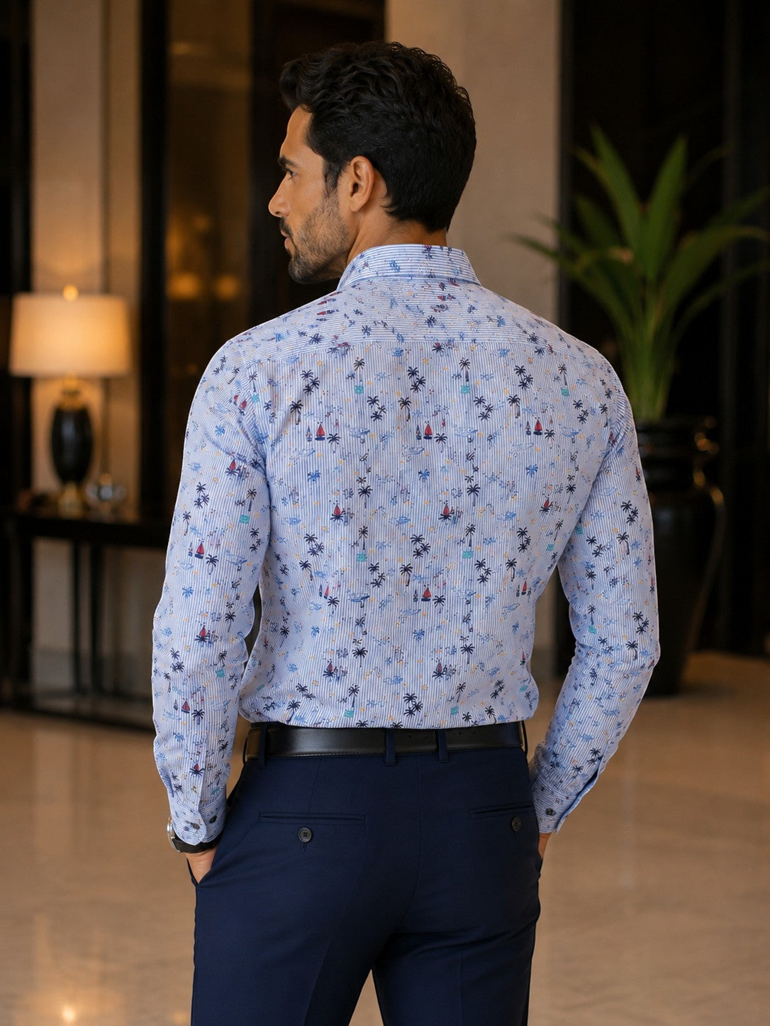 Barutti.ae Casamoda linen-blend shirt with nautical palm tree and sailboat print on blue pinstripe, back view.