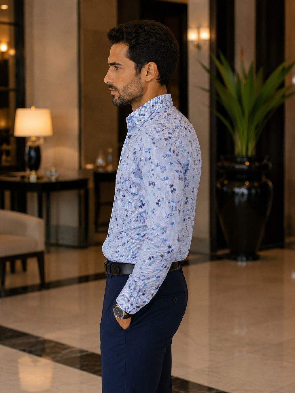 Barutti.ae Casamoda linen-blend shirt with nautical palm and sailboat print on blue pinstripes, worn by a man.