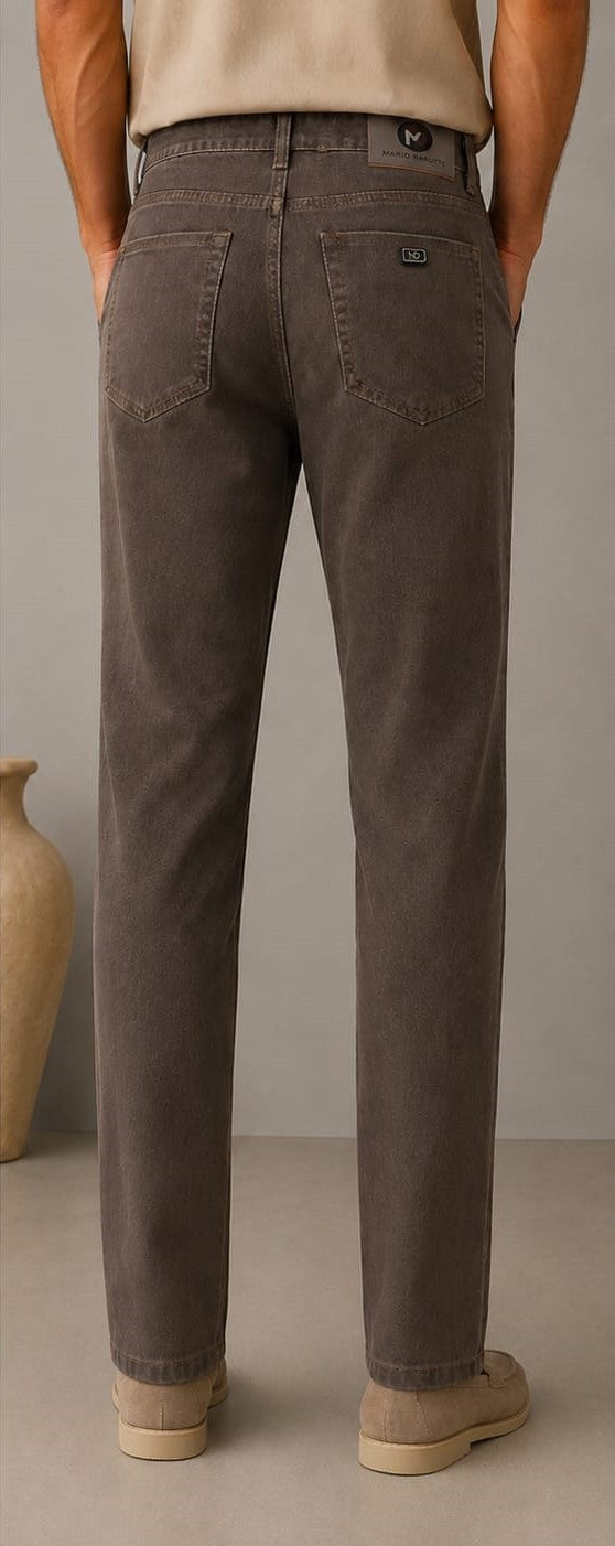 Barutti.ae charcoal-brown denim trousers with a classic five-pocket design, viewed from the back on a man.