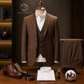 Marco Ricci copper three-piece suit on a mannequin with matching trousers, white shirt, and brown leather shoes.