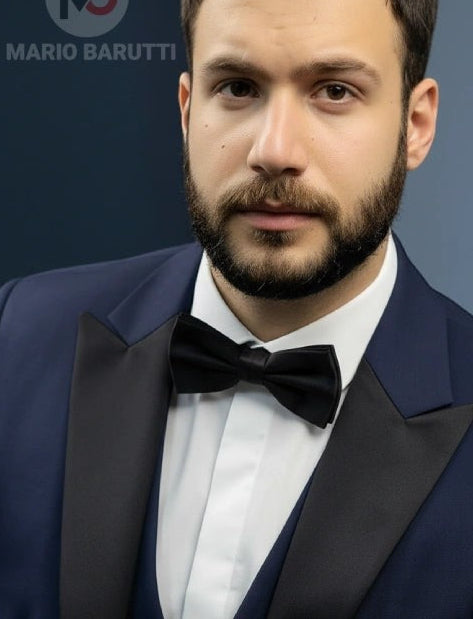 Mario Barutti navy tuxedo jacket with peak lapels and black bowtie worn by a bearded man in a modern fit