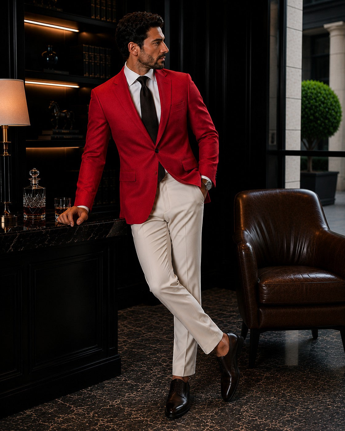 Barutti.ae red wool blazer with notch lapel worn by a man in a sophisticated lounge setting
