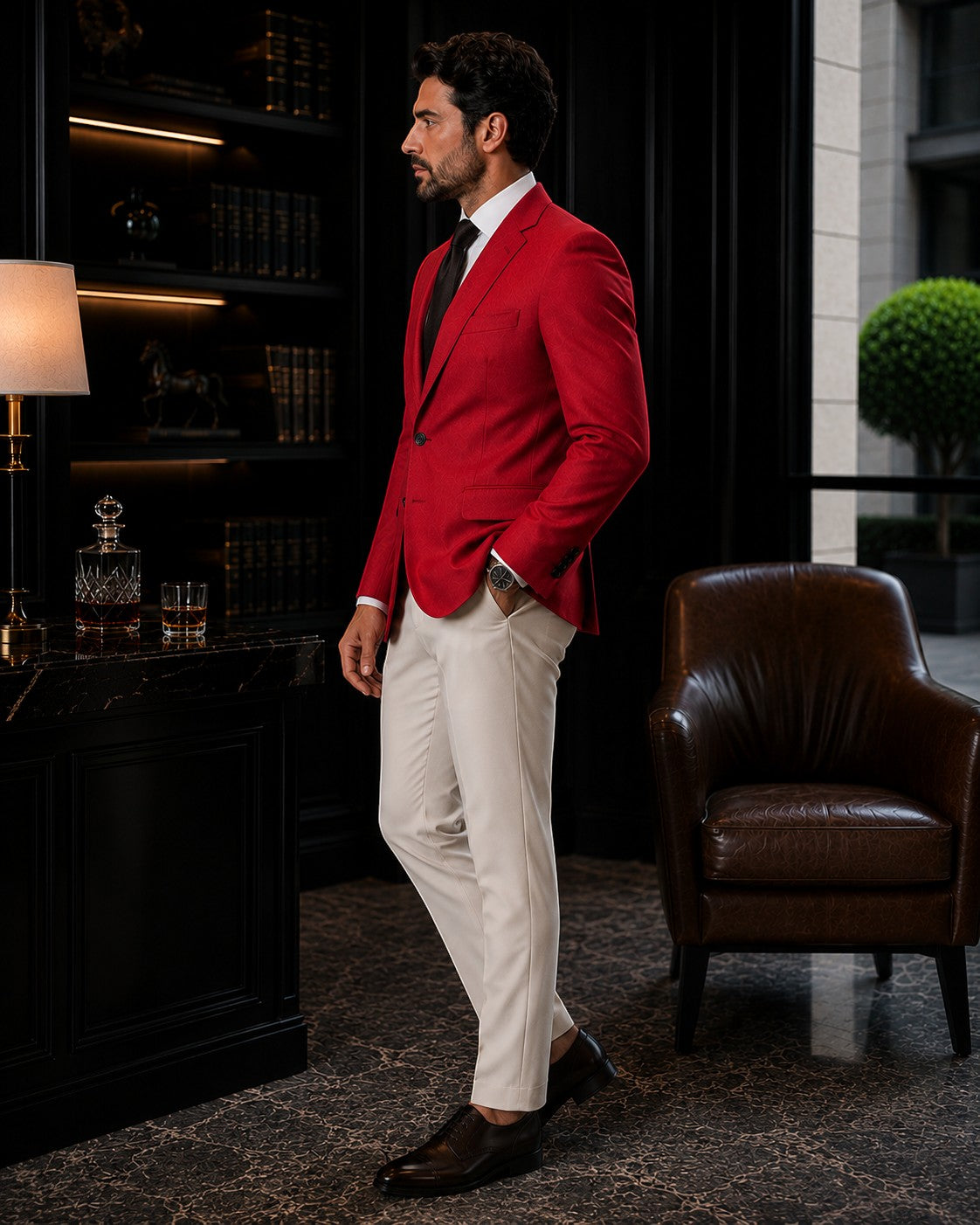 Barutti.ae red wool blazer worn by a man with white trousers in a luxury study setting