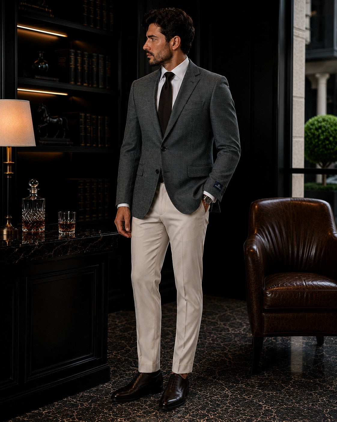 Barutti.ae sage green textured wool blazer with notch lapel worn by a man in a sophisticated office setting