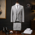 Marco Ricci silver pinstripe three-piece suit with jacket, waistcoat, and trousers on a mannequin with accessories.