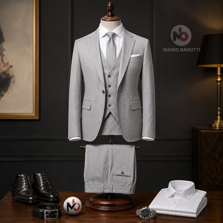 Marco Ricci silver pinstripe three-piece suit with jacket, waistcoat, and trousers on a mannequin with accessories.