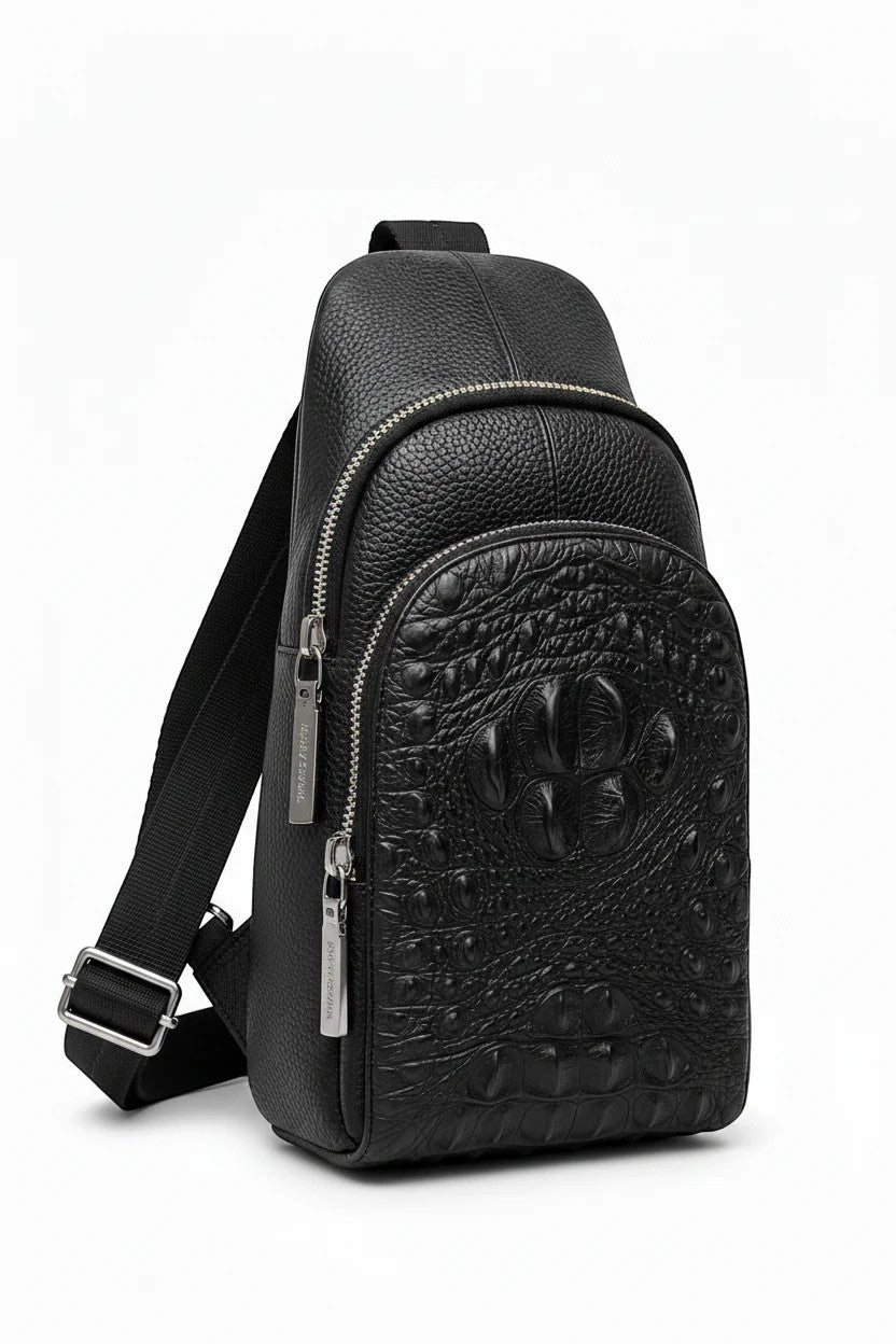Barutti black leather sling bag with crocodile-embossed front panel and adjustable strap.