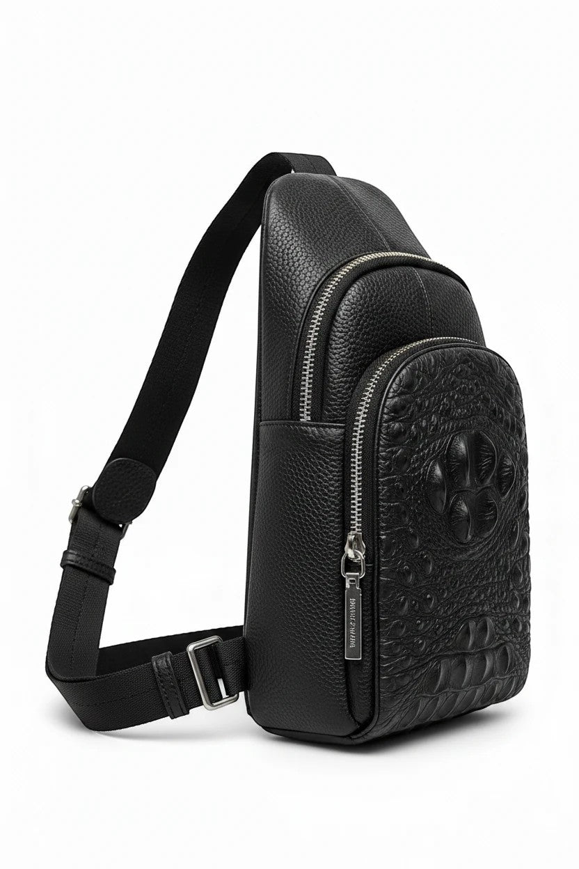 Barutti Bergamo black leather sling bag with crocodile-embossed front and adjustable strap.