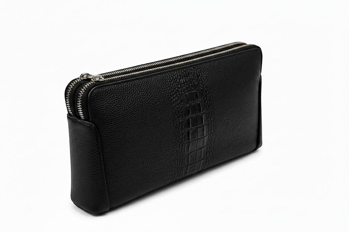 Barutti The Lecco black crocodile-embossed leather zip clutch with dual brass zippers.