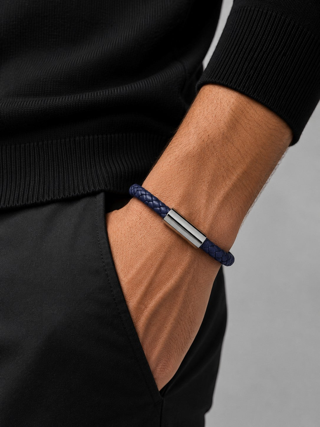 Barutti navy braided leather bracelet with a polished stainless-steel magnetic clasp.