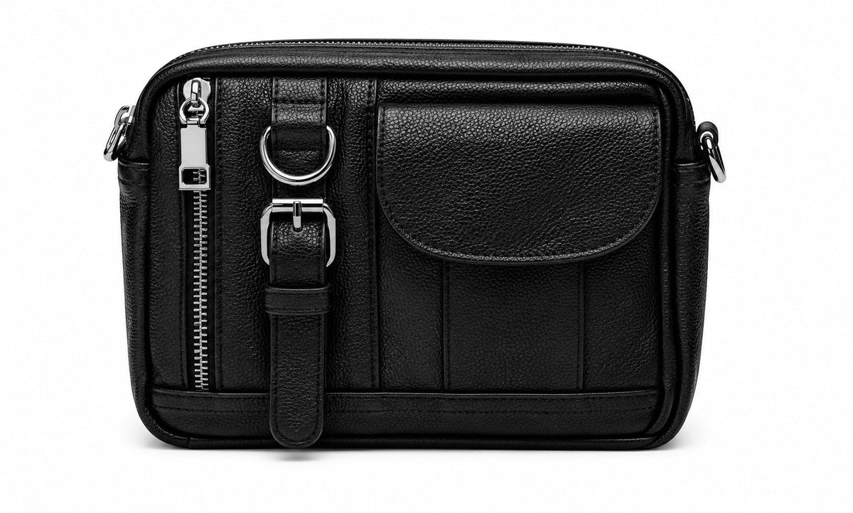 Barutti The Ravenna black pebbled leather camera crossbody bag with brass zippers.