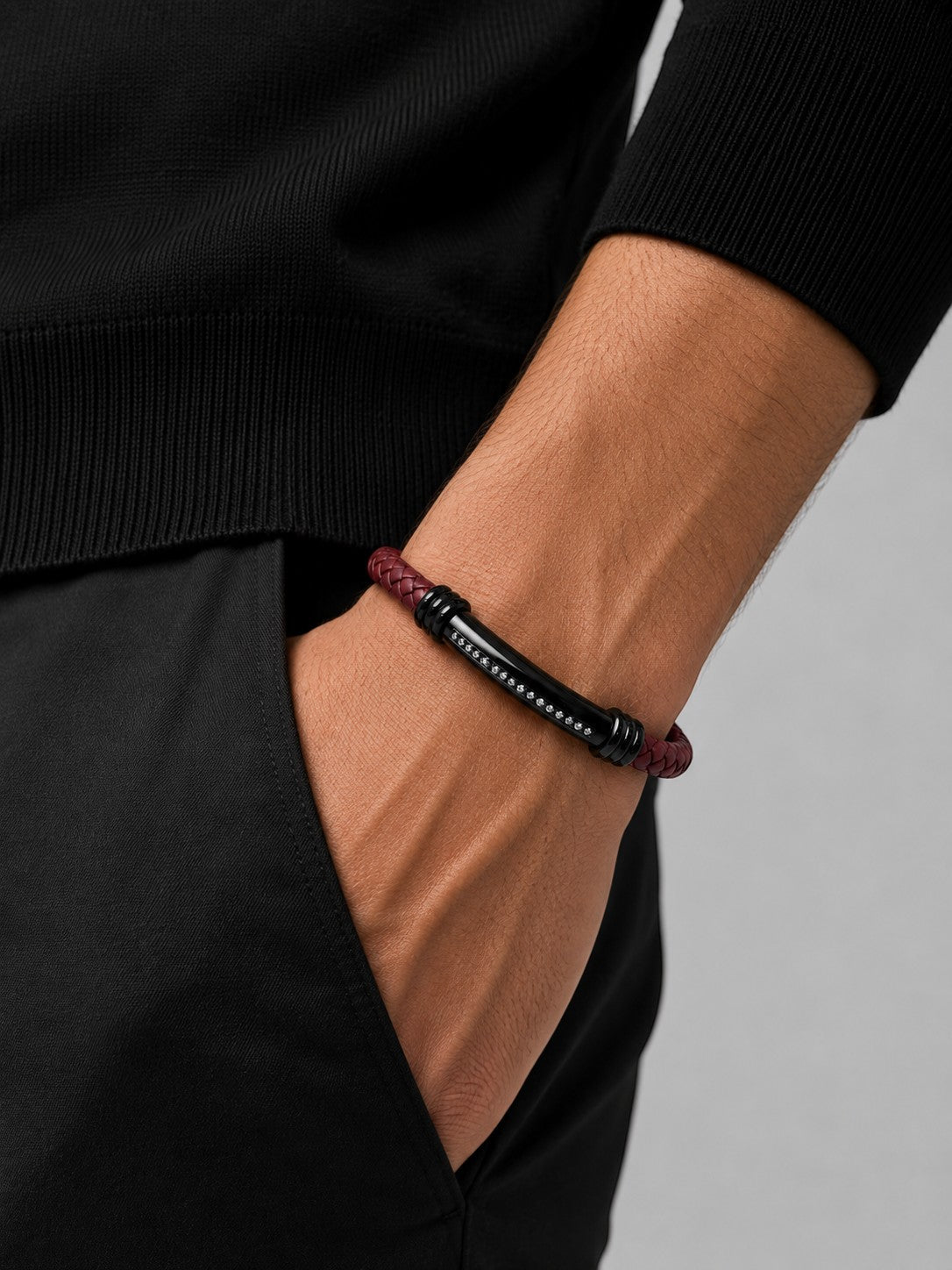 Barutti red braided leather bracelet with a black stainless steel ID bar and knurled inlay.