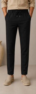 Man wearing Mario Barutti black linen drawstring trousers, front view, Mario Barutti Dubai