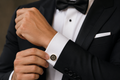 Gold and black crystal starburst cufflinks — Mario Barutti