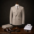Marco Ricci beige pinstripe double-breasted suit with peak lapels.
